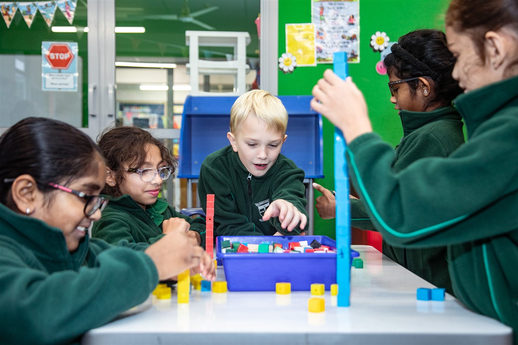 A group of St Patrick's students building together with blocks in their classroom
